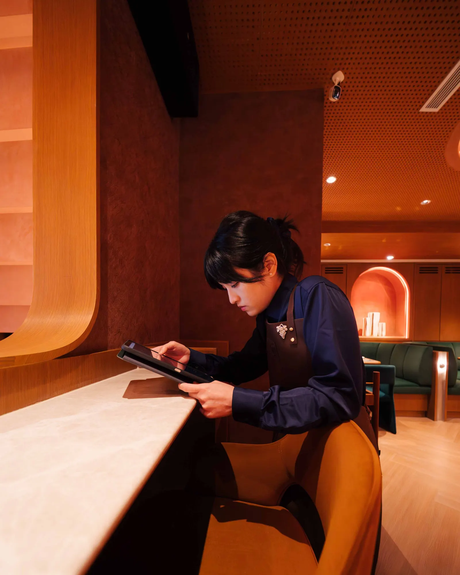 Server checking the system on a tablet